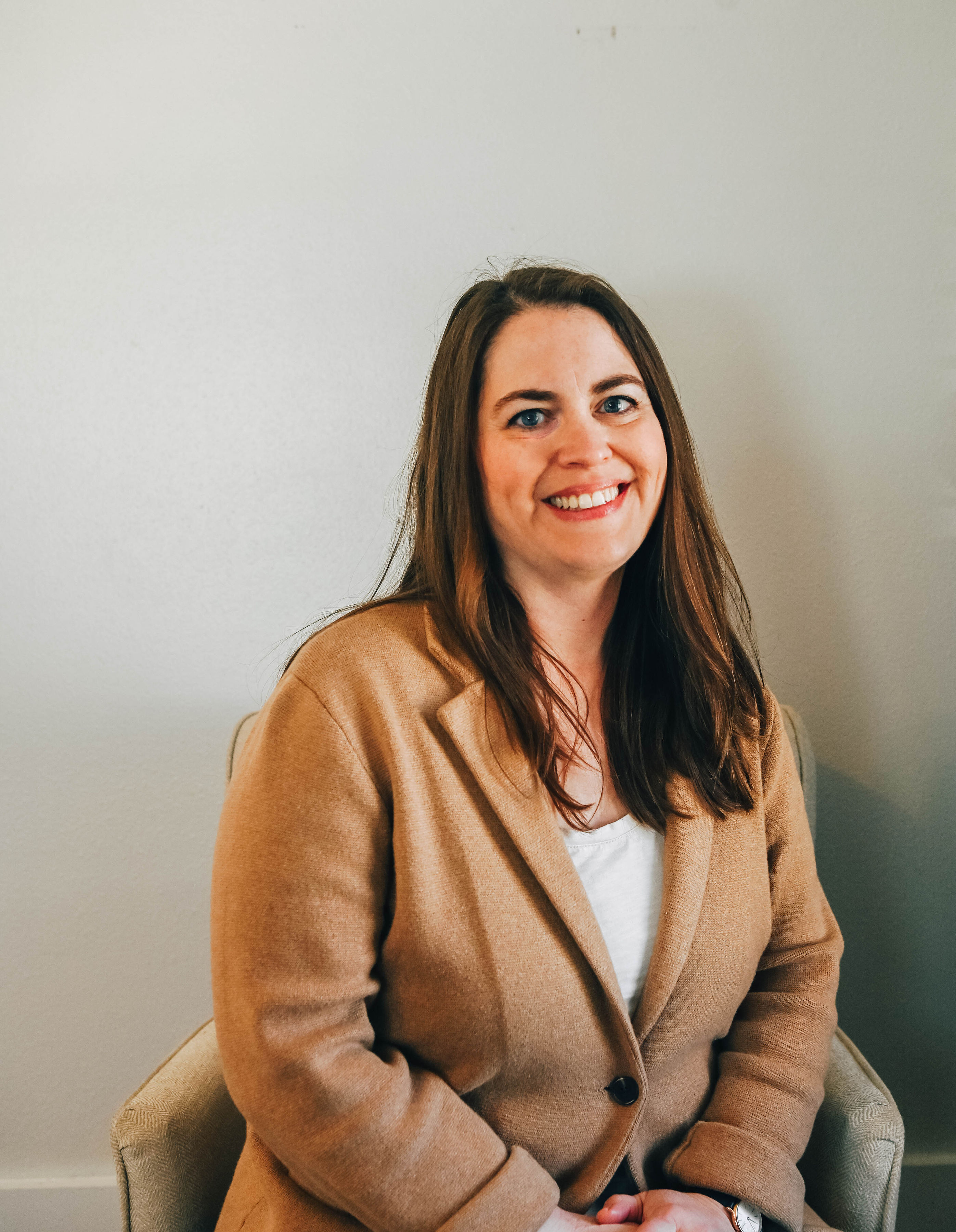 a woman smiling for the camera